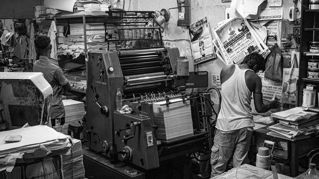 Offset press running mail production inside the KDO Cincinnati facility
